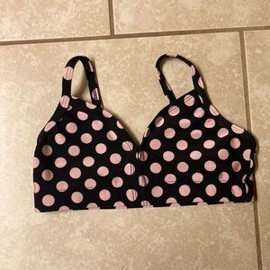 Pink polkadotted sports bra top, black and pink